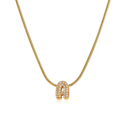 Inicial mini zirconias dorada